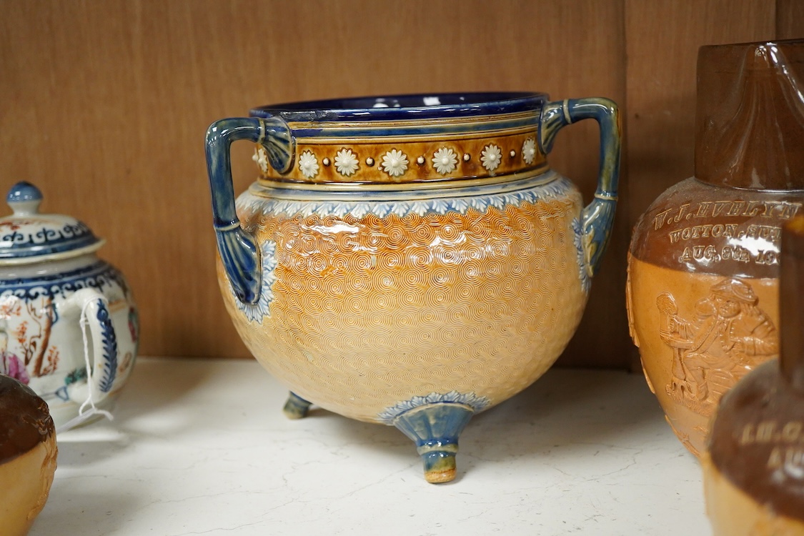 Four graduated Royal Doulton harvest jugs and a Royal Doulton Lambeth three footed jardiniere- 17cm high